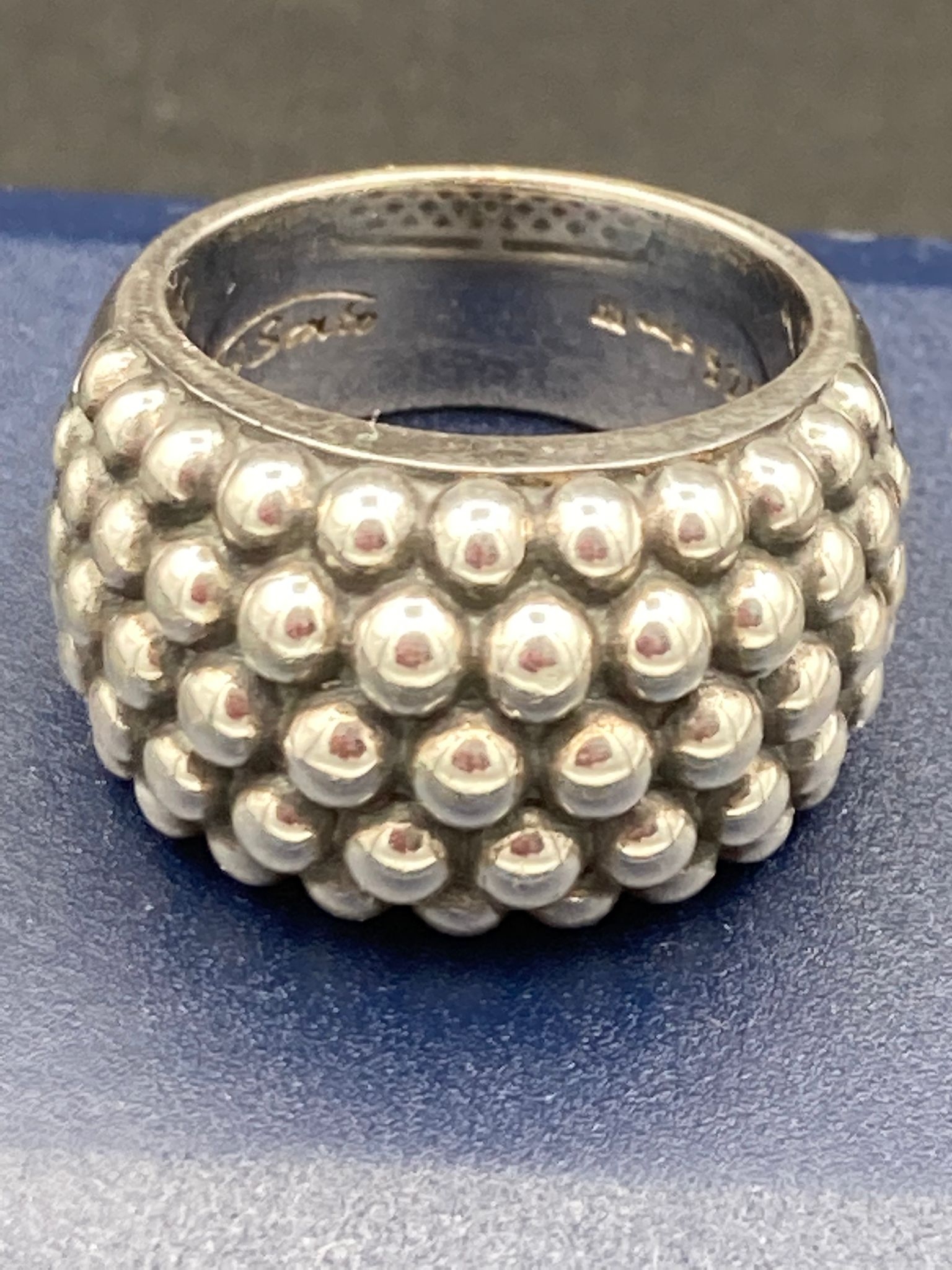 Silver ring by Ti Cento of Milan having silver bead ?keeper? design to top . Clear marking inside