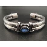 Vintage Silver Bangle with Blue Opal. 6cm diameter. 28.86g