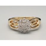 9K Yellow Gold Diamond cluster ring, 0.35ct. Millennium hallmark. Size S and weighs 3.9g.