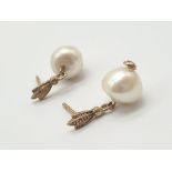 A Pair of Natural Pearl Earrings. 4.21g