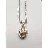 14K White Gold and Diamond Teardrop Pendant. 0.10 Carat - Approx. 42cm. 3.06g