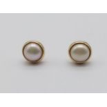 Pair of 14k Yellow Gold and Pearl Stud Earrings. 2.15g