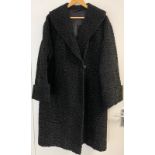 Ladies vintage 1950's black Astrakhan fur coat. Great condition for age, size fits a UK14/16.