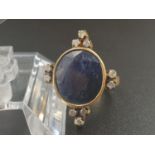 10ct Blue sapphire ring with .30cents white Diamond accents. Size N/O