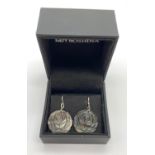 Sterling Silver and Mother of Pearl earrings. 3.5cm drop and in a presentation box.