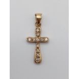 9K Yellow Gold and Diamond Cross Pendant. Eleven Diamonds. 1.25g