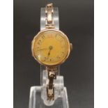 Vintage, possibly Antique 9k Yellow Gold Ladies Watch. Expandable strap. Gold Dial. As Found. 18g