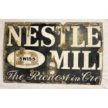 Half of an Original Vintage Nestle Milk Sign. Condition as per photos. 64 x 40cm.