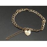 9K Yellow Gold Flat Curb Link Bracelet with Heart Charm. 18cm. 2.58.