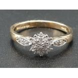 9K Yellow Gold Diamond cluster ring, 0.15ct. Size K and weighs 1.8g.