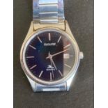 Gentlemans ACCURIST wristwatch ,having black face with sweeping second hand . Features include