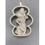 Silver Saint Christopher pendant set in attractive design silver border. 4 cm drop.