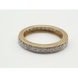 A 9K Yellow Gold White Stone Eternity Ring. Size O. 2.12g