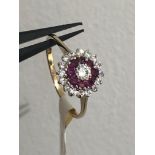 9k yellow gold ring with clear stones and rubies; 1.67g; size L1/2