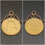 "A SOUTH AFRICAN 22K GOLD HALF POND DATED 1895 IN A 9K GOLD SETTING. 4.5gms "