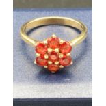 Ladies 9 Carat GOLD red spinel cluster ring. Full UK hallmark. 3.0 grams .Size N.