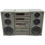 A TECHNICS STACK STEREO SYSTEM COMPRISING OF CD TUNER, AMP, TAPE DECK AND 2 SPEAKERS. 39 X 21 cms.