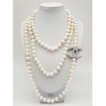 A Chanel-Style White Metal Pearl Rope Necklace. 150cm.