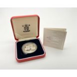 The Royal Mint Queen's 70th Birthday Celebratory Silver Coin. Comes in presentation box. 28.2g