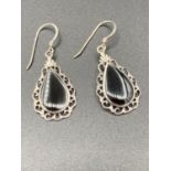 Pair of SILVER and BLACK ONYX drop earrings . Pear shaped.