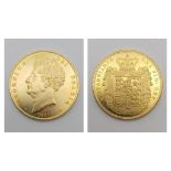 A GOLD PLATED RESTRIKE OF A GEORGE IV £5 CROWN.