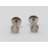 A Pair of 14K White Gold Diamond Stud Earrings. 0.82 Carat - VVS.