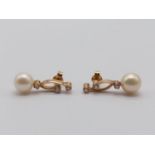 A Pair of 18K Yellow Gold Diamond and Natural Pearl Earrings. 4g