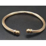 18K Yellow Gold Bangle with Twist Decoration. 6.5cm Diameter. 13.45g