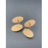 Vintage 9 Carat Gold chain cufflinks ,chased with scroll and floral design . 5.8 grams.