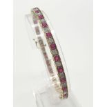 9K YELLOW GOLD DIAMOND & RUBY BRACELET 11.5G 1.25CTS DIAMONDS PLUS 2.50CTS RUBIES. 20CM.