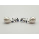 18K WHITE GOLD DIAMOND, SAPPHIRE & SOUTHSEA PEARL DROP EARRINGS.