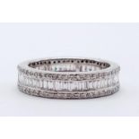 AN 18K WHITE GOLD FULL ETERNITY RING WITH CHANEL SET QUALITY DIAMONDS. WEIGHT:6.7g. SIZE: Q