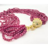 An impressive, fifteen rows of Burmese faceted rubies necklace with a highly glamorous clasp in