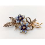 18k white and yellow gold floral designed brooch with rose diamonds, blue enamel and seed pearls