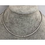 18k white gold tennis necklace with 10.07cts of diamonds G/SI, 17inches long and weight 19.76g