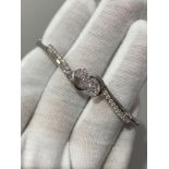 18K WHITE GOLD DIAMOND TWISTED BANGLE WITH TRILOGY CLUSTER DIAMONDS (APPROX 0.80CT G/H-VS/SI) WEIGHT