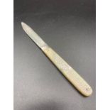 Antique silver bladed fruit knife having mother of pearl handle with silver bead work ,clear