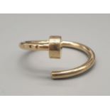 14k yellow gold cross over designer ring, weight 2.04g and size L