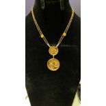 18K YELLOW AND WHITE GOLD DROP PENDANT ON DOUBLE STRAND NECKLACE. WEIGHT 22.87G