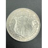 Silver half crown 1914 in extra fine/brilliant condition.Bold detail and definition to both sides.