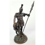 A BRONZE STATUE OF A ROMAN GLADIATOR FIGHTING A LION. 5.2kg 41cms.