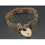 9K Yellow Gold Ladder-Link Bracelet with Heart Charm. 16cm. 21.84g