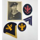 A Kriegsmarine Coastal Artillery Badges with photograph of the serviceman.