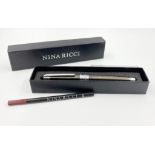 A Nina Ricci Ballpoint Pen. As new, in box.