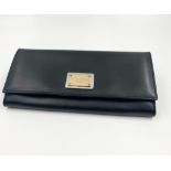 A Dolce and Gabbana Black Leather Luxury Purse. Portafoglio Vitello Liscio. Unused, as new, in