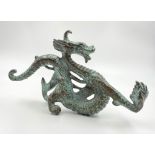 A Vintage Chinese Bronze Dragon. 22 x 12cm