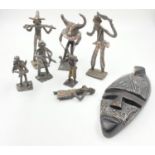 A Selection of Antique African Metal warriors. Seven Pieces plus a small African mask.