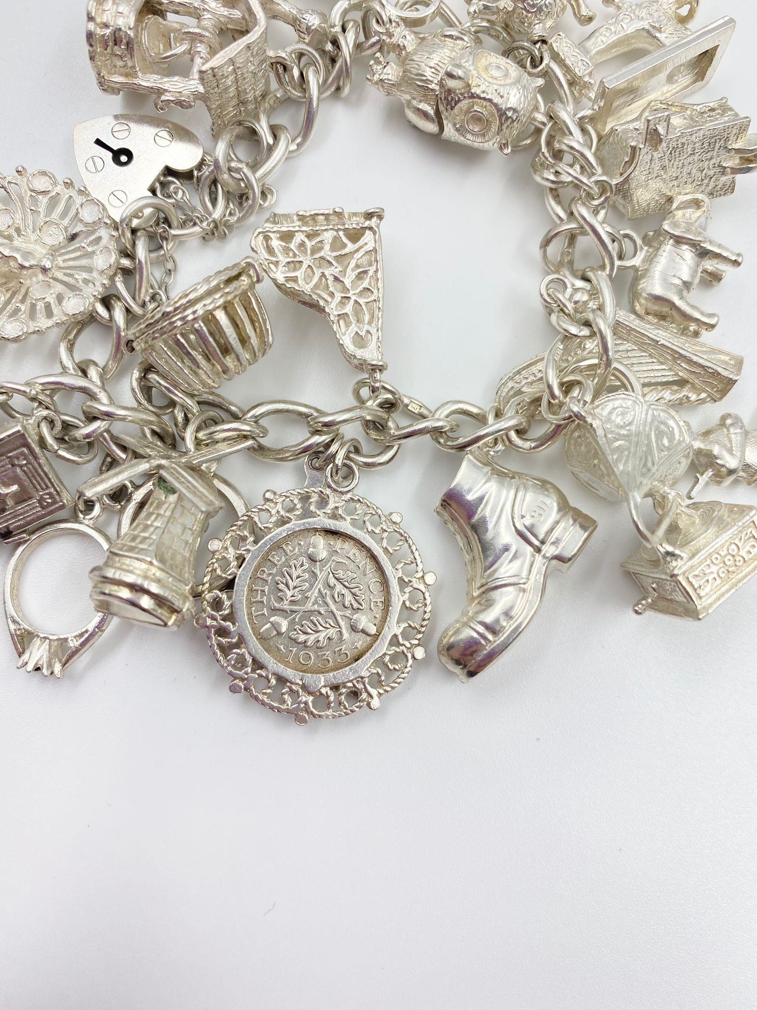 STERLING SILVER CHARM BRACELET WITH 20 CHARMS. 84.2G - Image 4 of 6