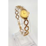 A 9K Yellow Gold Ladies Accurist watch. As Found. 8.8g