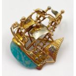 A 19.2K (800) Portuguese Yellow Gold Brooch or Pendant. Intricate ship design with Turquoise stone